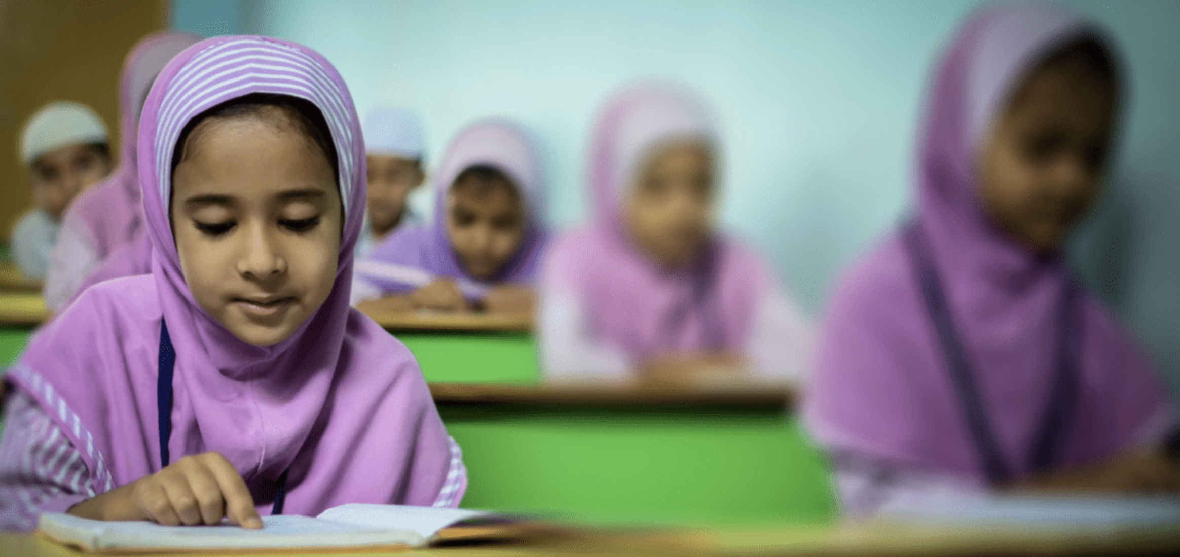 Girls reading at school