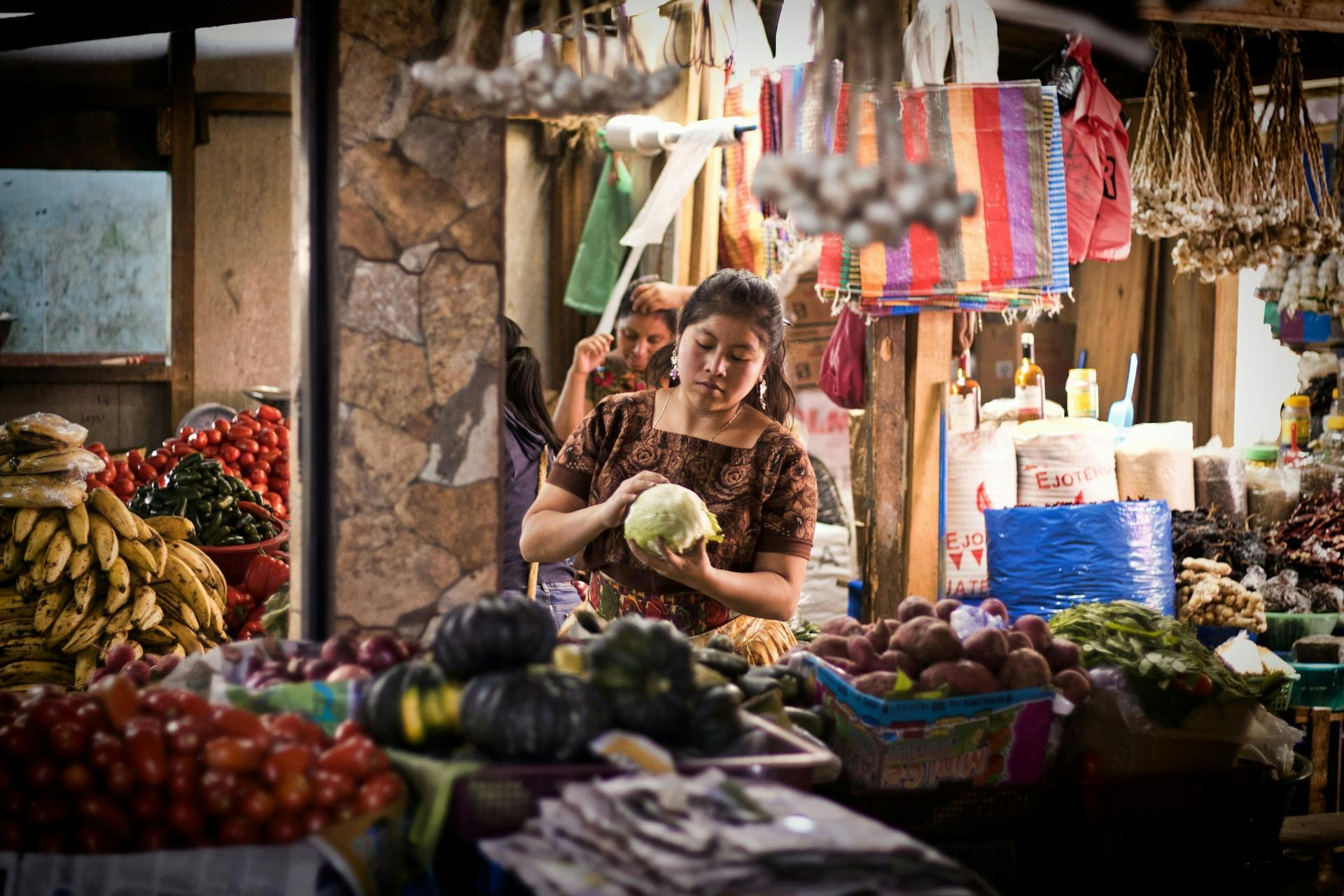 Girl in market Guatemala
