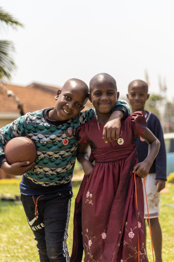 Small group of children with a football