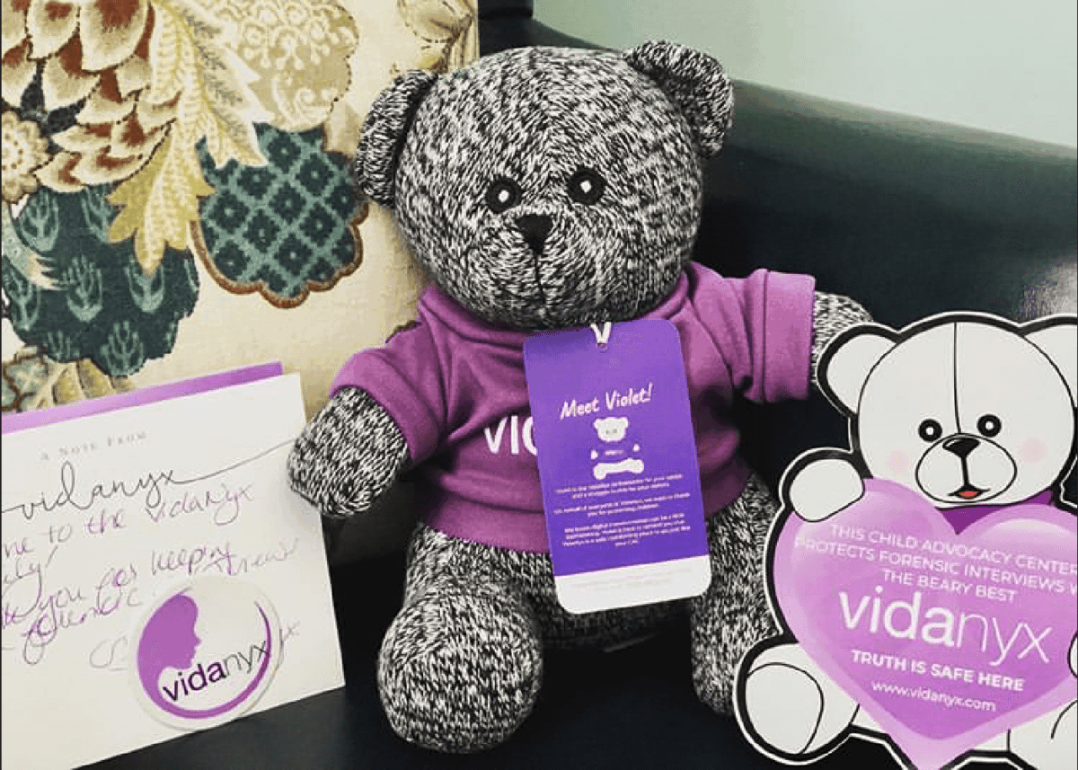 Violet bear vidanyx mascot